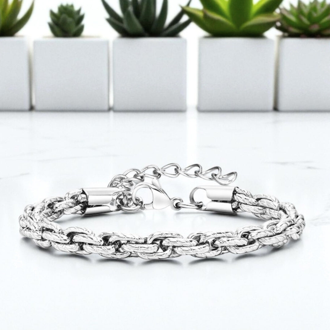 Bracelet homme motifs serpent argent table blanche plantes presentation