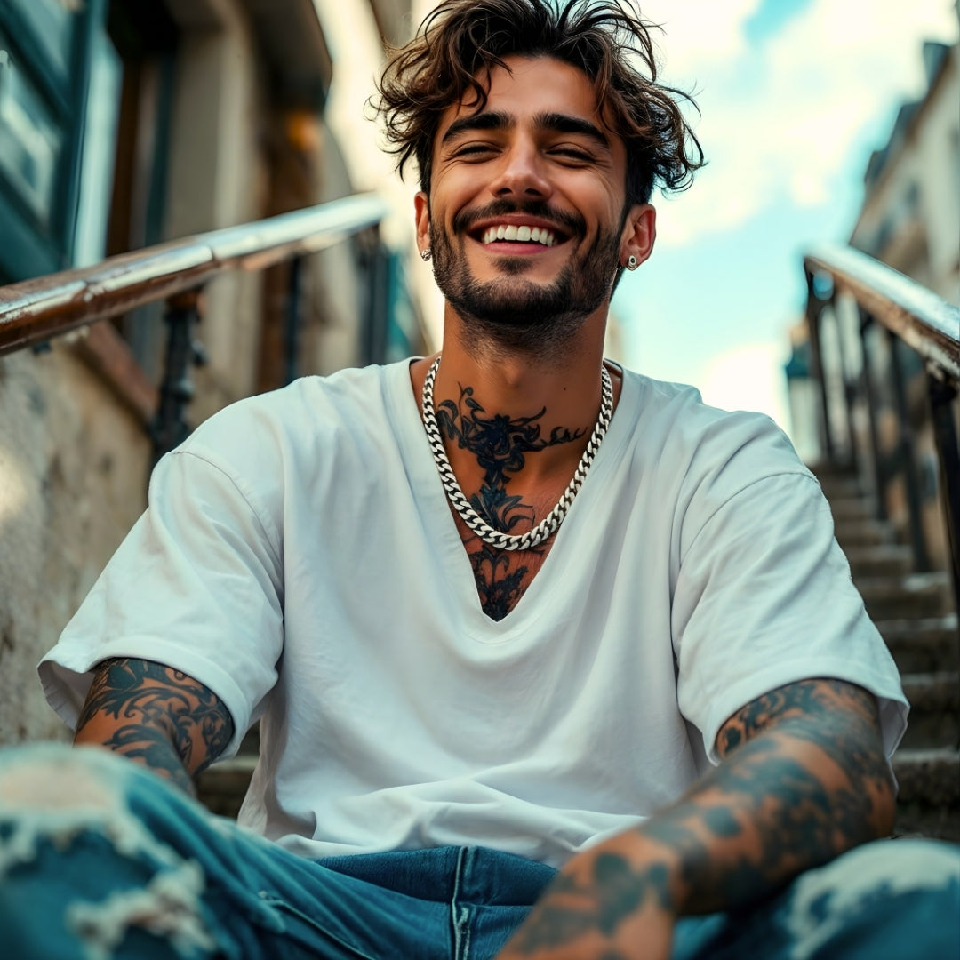 CHAINE HOMME MAILLONS CUBAINS ARGENT JEUNE HOMME HEUREUX ESCALIER