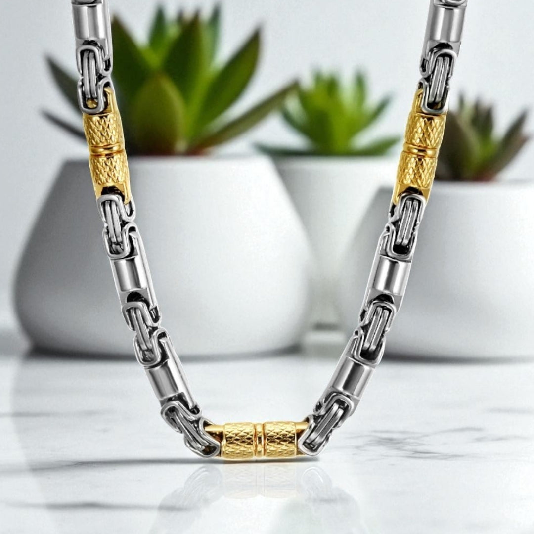 Chaine homme byzantine RLX variante argent dore presentation table marbre plantes succulentes