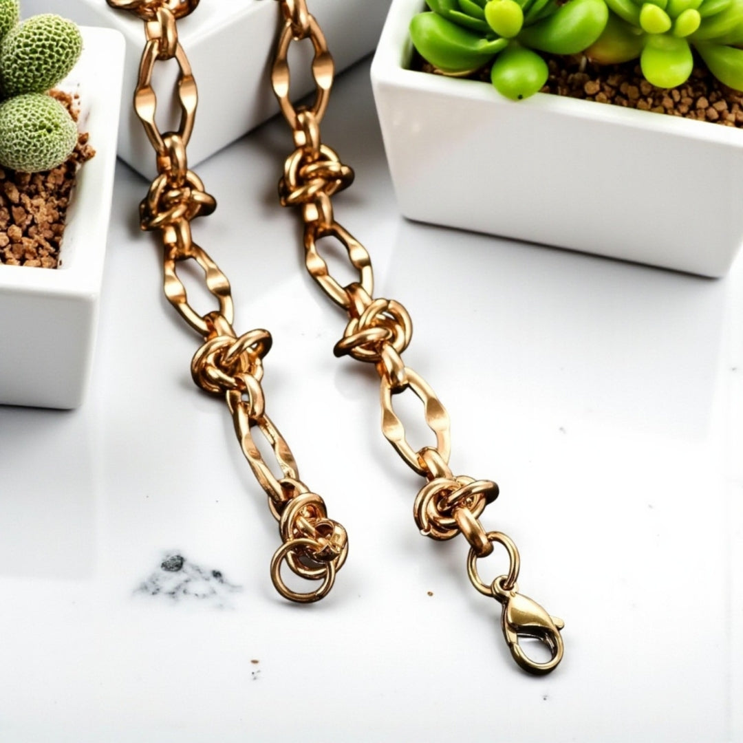 Chaine homme collier homme maillons barbelés noeufs variante doré