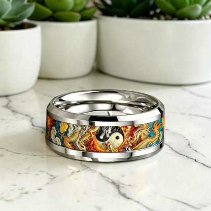 Bague mystique Dragon Yin-Yang acier inoxydable posée sur marbre - bague homme mmihommesmodernes.com