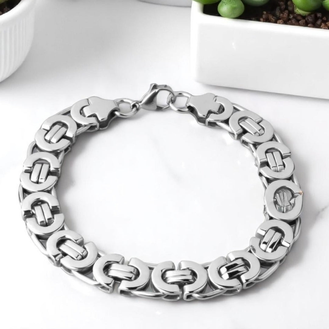 Bracelet homme BYZANTIN EMPEREUR ARRONDI™ argent table blanche plante