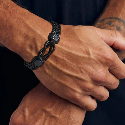 Bracelet homme INFINOTO KNOTO™ noir poignet mains