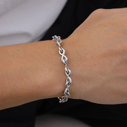 Bracelet homme NŒUD INFINITO™ chemise blanche poignet presentation