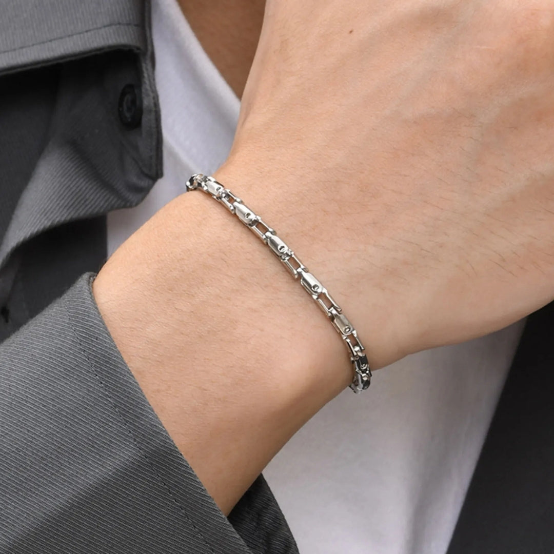 Bracelet_homme_OPEN_LINK_argent chemise grise poignet  