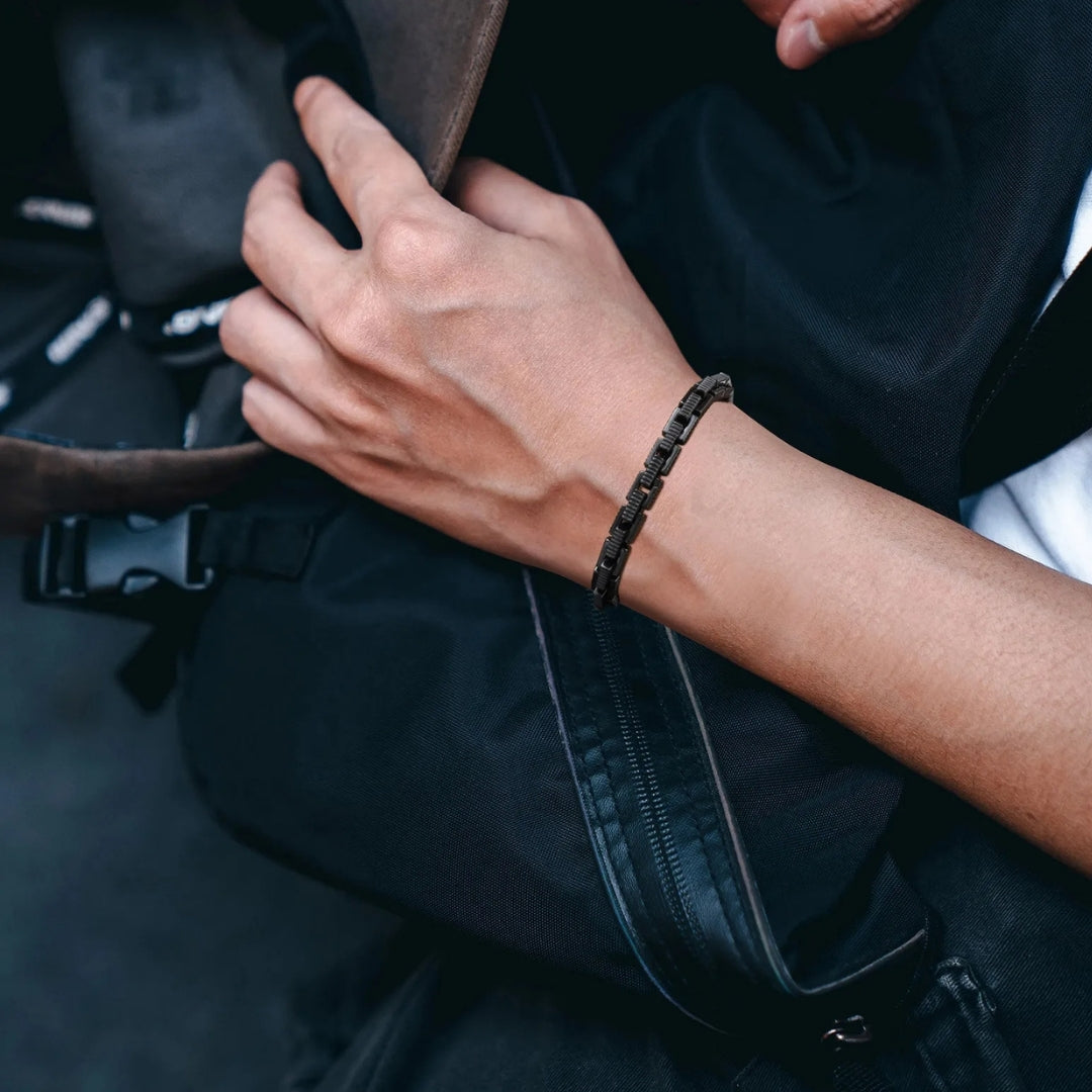 Bracelet homme TRACK LINK™ noir  poignet action