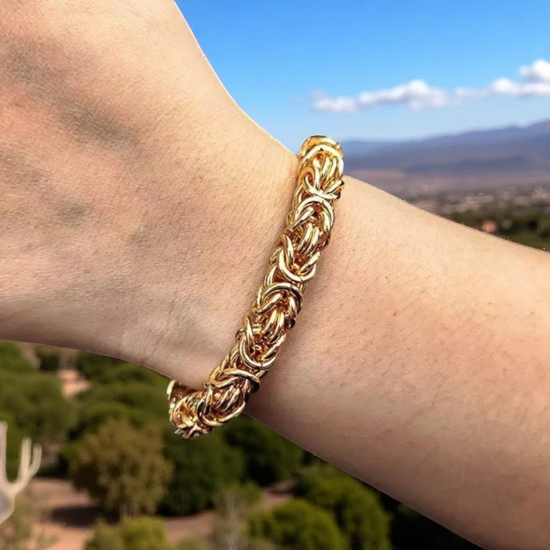 Bracelet homme WOVEN KNOT™dore poignet ciel bleu Paris