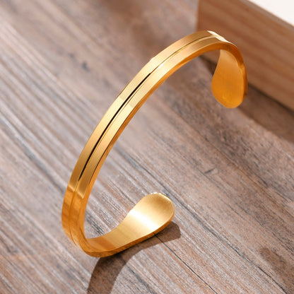 Bracelet homme le LUXURE™ dore table bois