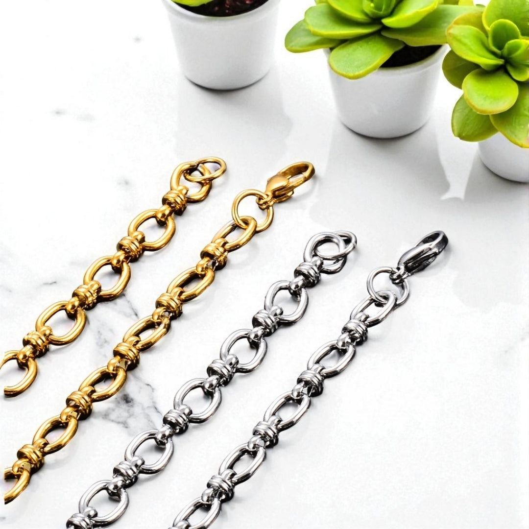 Bracelet homme maillons ovales dore argent presentation marbre fermoir
