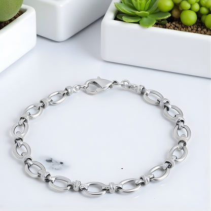 Bracelet homme maillons ovales variante argent presentation marbre 