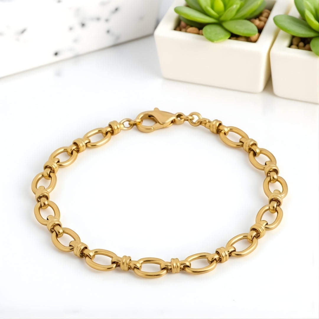 Bracelet homme maillons ovales variante dore presentation marbre 
