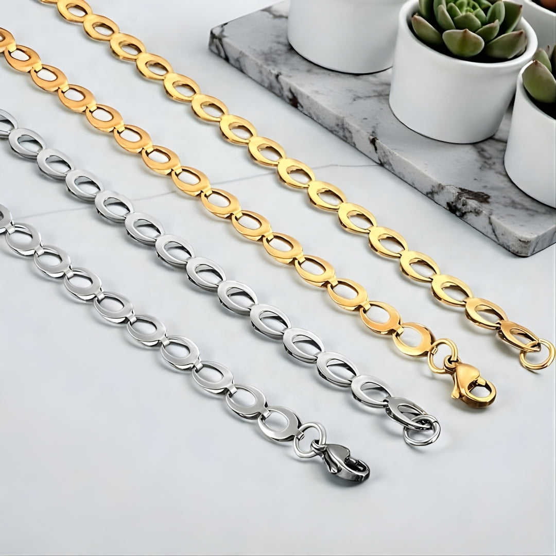 CHAINE HOMME MAILLE OVALES dore argent presentation plantes table blanche fermoirs