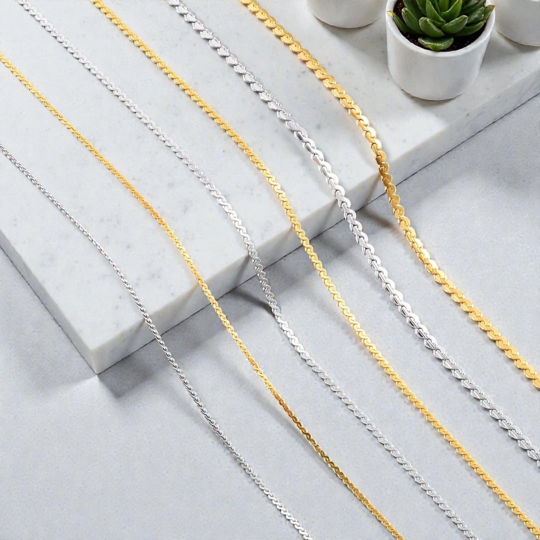 CHAINE HOMME SINGAPOUR DORÉ ARGENT PRESENTATION DIMENSIONS MARBRE PLANTES