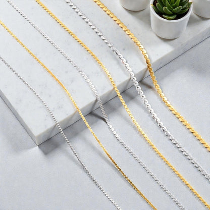 CHAINE HOMME SINGAPOUR DORÉ ARGENT PRESENTATION DIMENSIONS MARBRE PLANTES