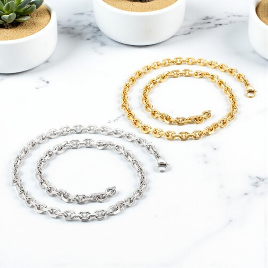 Chaine homme CHAINY LINK 6 mm argent doré table marbre plantes presentation