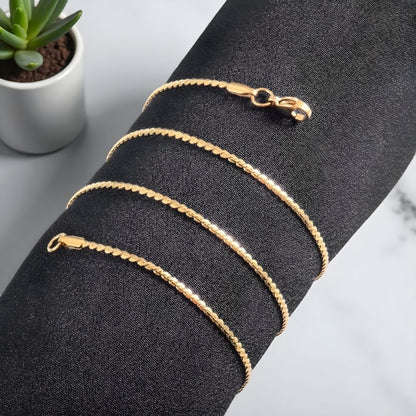 Chaine homme Collier fin 1,5 mm en S doree enroulee