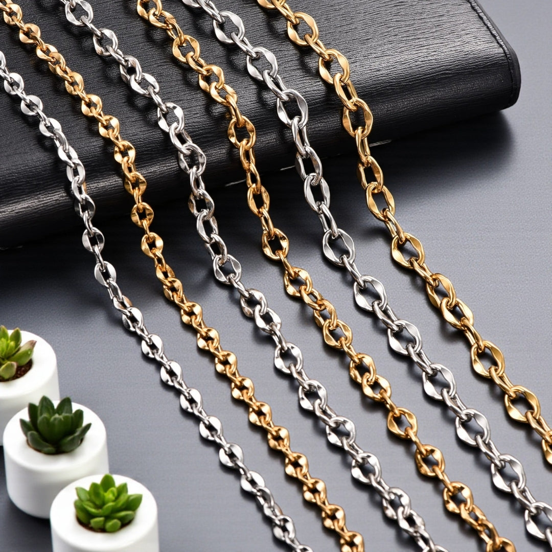 Chaine homme Maille Cheval argent dore presentation livre table grise longueur plantes