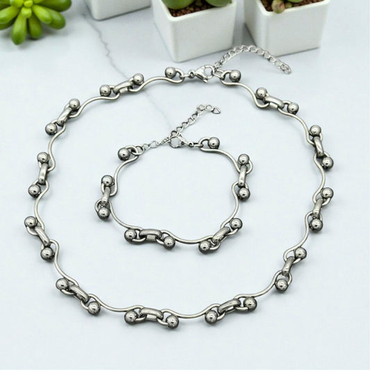 Chaine_homme bracelet homme à_billes_ondulees_presentation_table_marbre