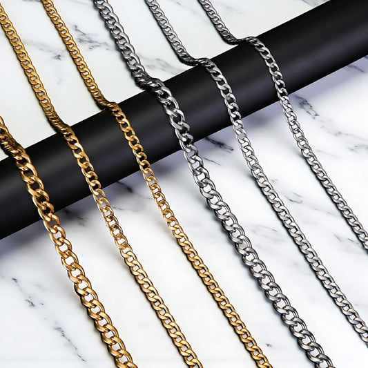 Chaine homme collier Cubain dore argent table marbre