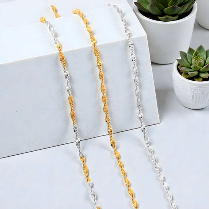 Chaine homme plate torsadee variante bcolore trois variantes bicolore dor. argent