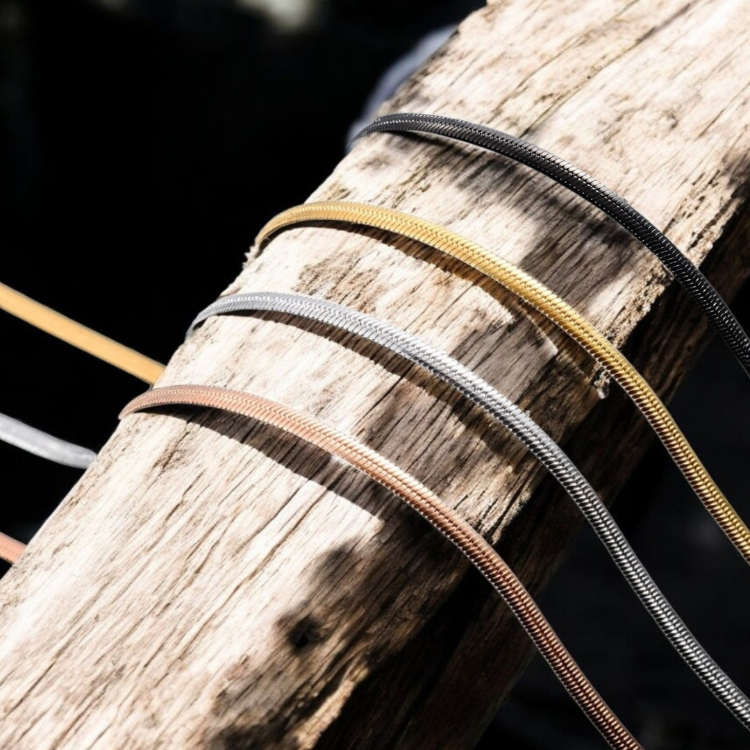 Chaine homme serpent plate presentation variantes quatre couleurs buche 