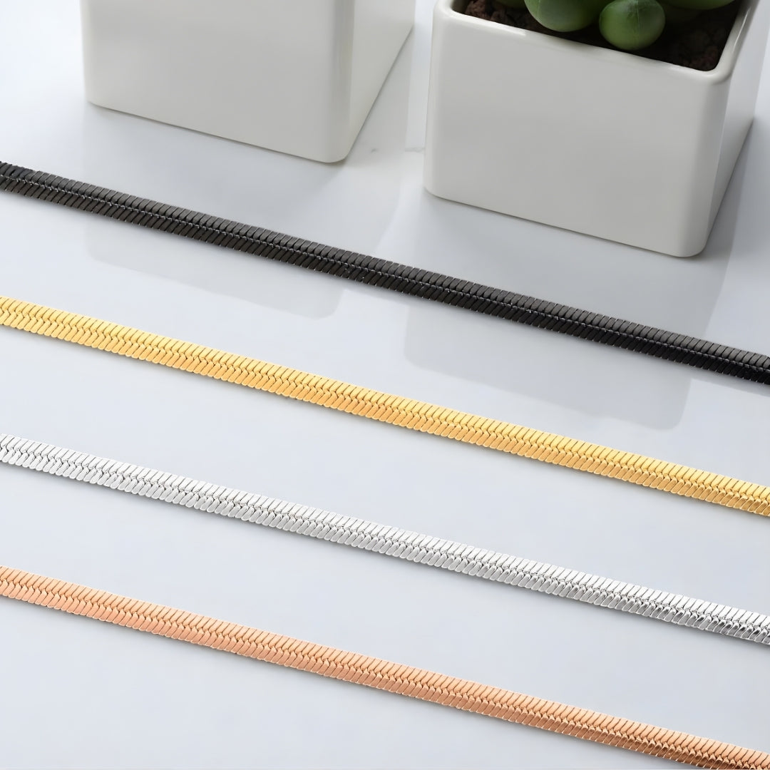 Chaine homme serpent plate presentation variantes quatre couleurs plantes 