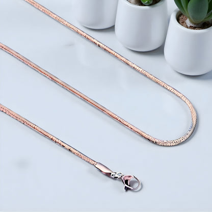 Chaine homme serpent plate variante rose