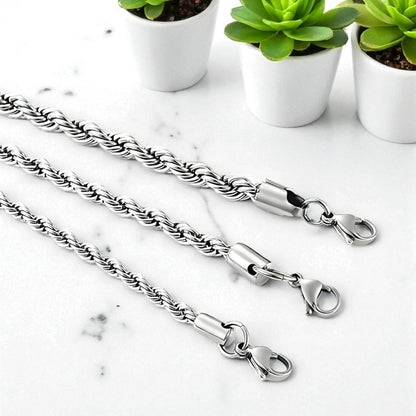 Chaine homme torsade Collier homme presentation variante argent table marbre 