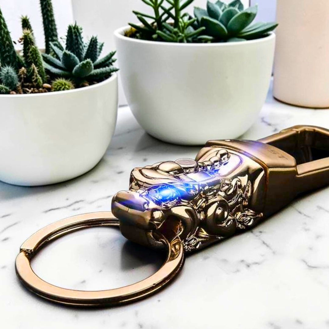 Le Porte-Clé Pixiu Impérial dore yeux lumineux table marbre plantes