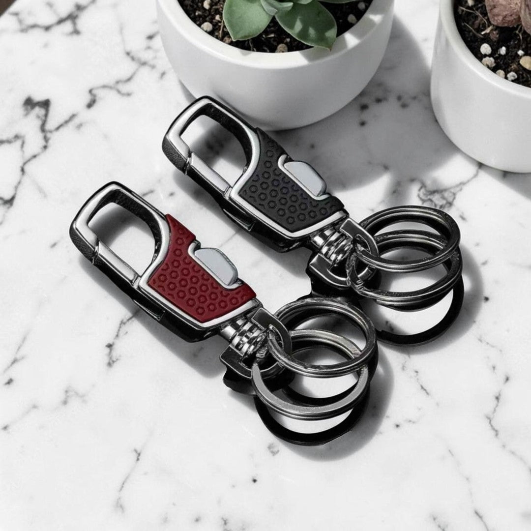 PORTE CLE homme, L'Urban Clip variantes noir et brun table marbre