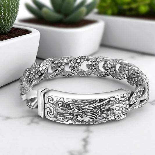 bracelet homme dragon head argent plantes table marbre presentation