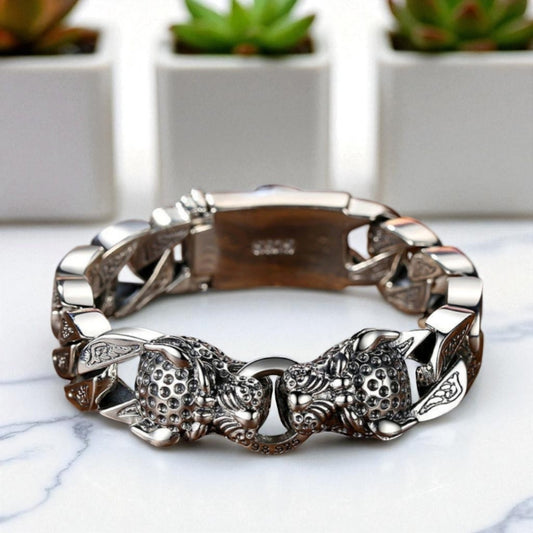 bracelet homme léopards deux tetes argent plantes table marbre presentation