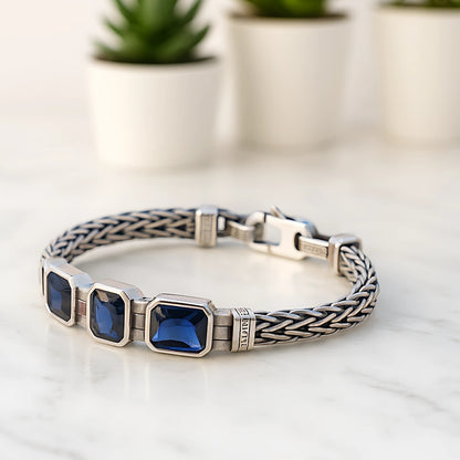 bracelet homme tendance pierres bleues table blanche plantes