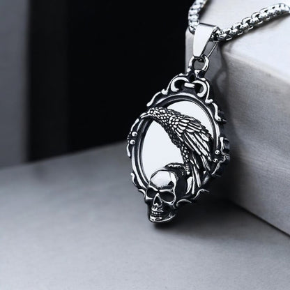 collier-homme-pendentif-miroir-magique-corbeau-t¸ete-de-mort-ciment